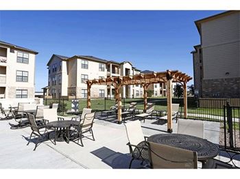Expansive tanning deck and pergola